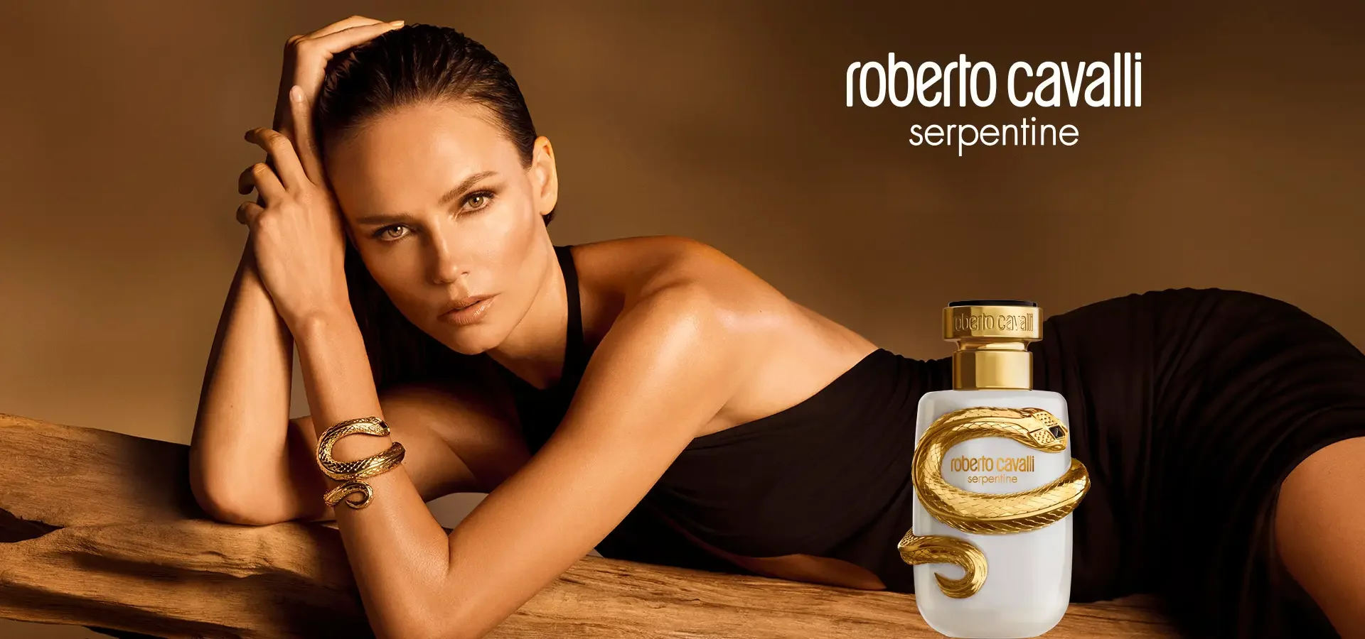 Roberto Cavalli Serpentine fragrance with a model.